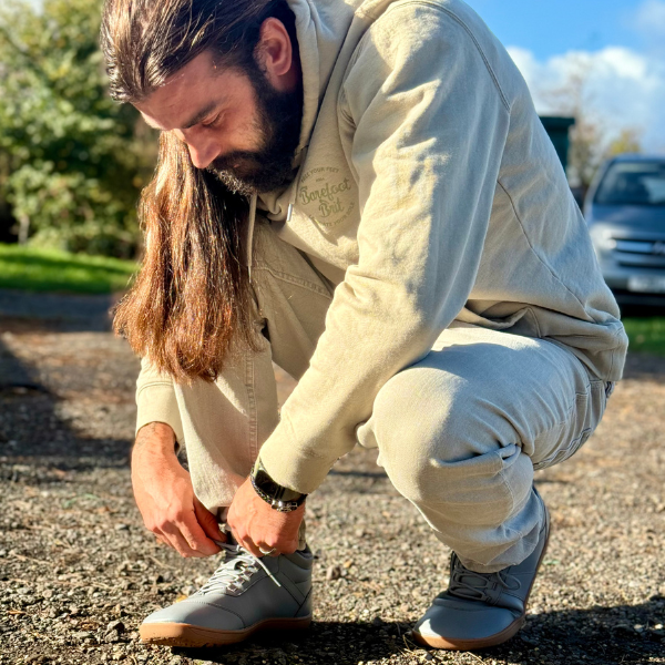 Man wearing barefoot shoes outdoors