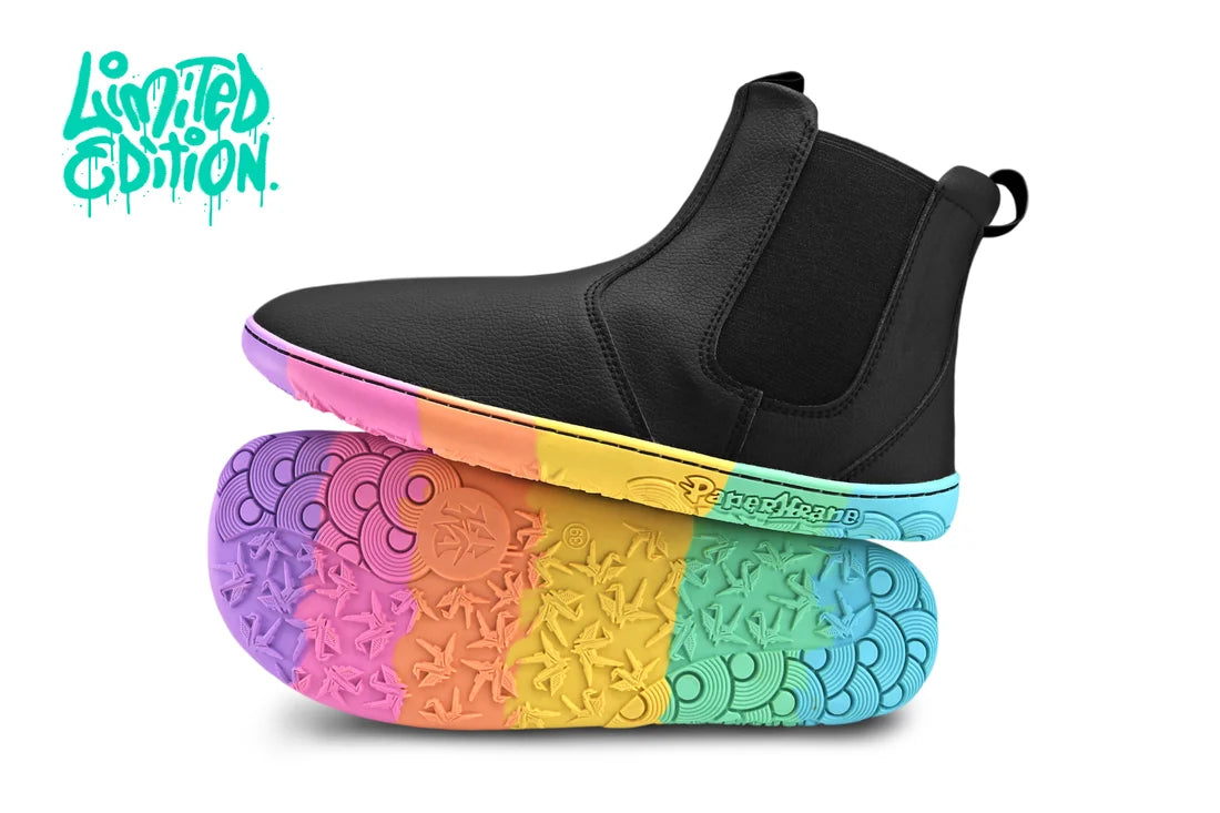 Side profile of PaperKrane Kranebow barefoot boot showing flexible rainbow rubber sole