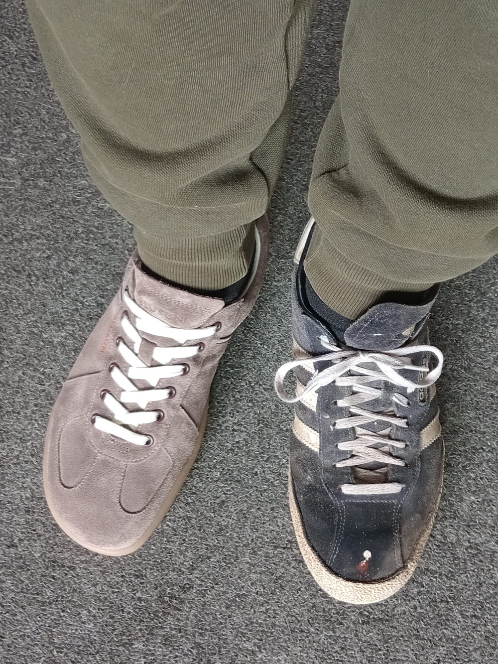 Real-life comparison of foot-shaped BLUSUN barefoot sneaker next to narrow tapered conventional shoe