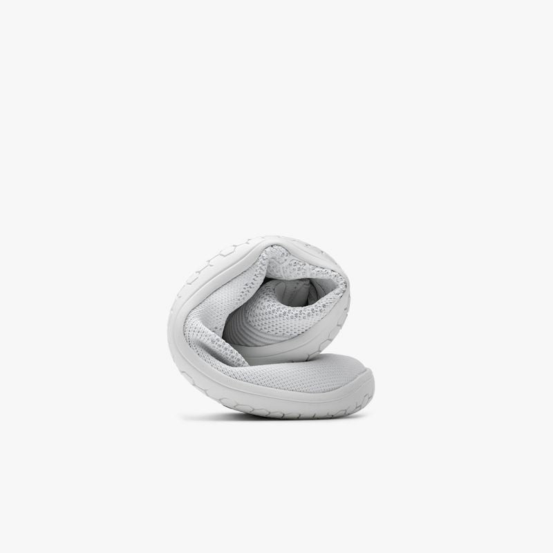 Vivobarefoot Primus Lite Knit Bright White women's barefoot trainer, side profile