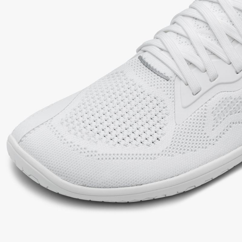 Vivobarefoot Primus Lite Knit Bright White women's barefoot trainer, front view showing wide toe box